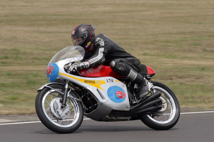 Guy Martin rides a Honda Six replica at Castle Combe